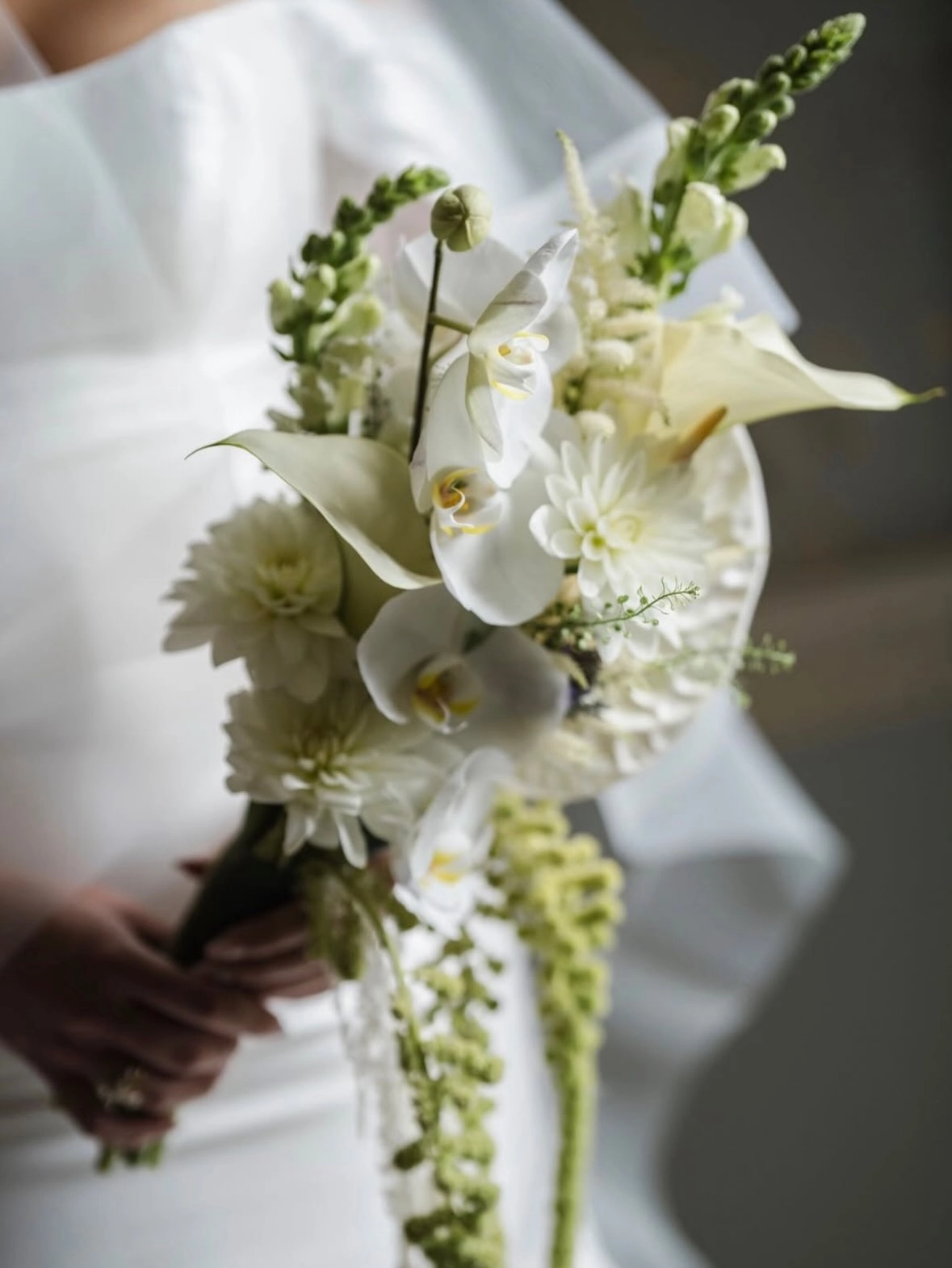 Sculptural modern bridal bouquet with hanging amaranthus